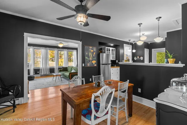 a kitchen with a sink appliances and cabinets