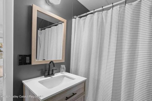 a view of a bench in a backyard