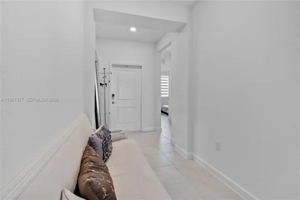 a hallway with a couch