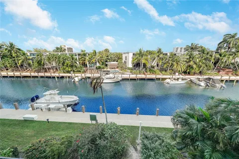 a view of a lake with a city