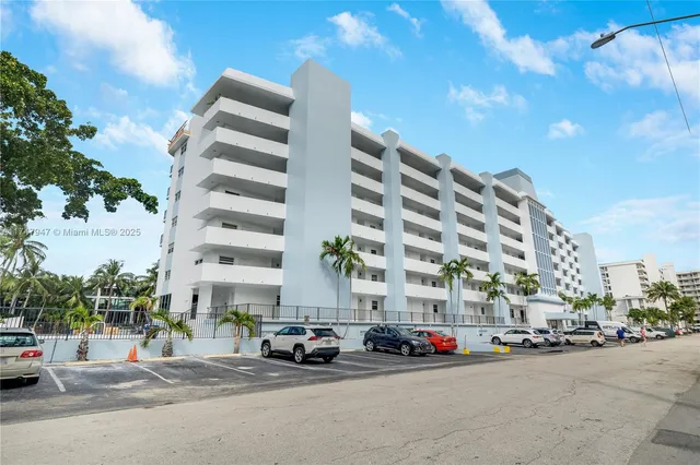 a view of a street with cars