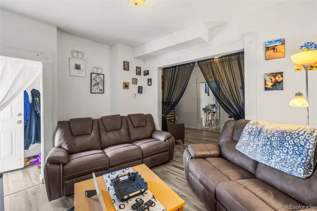 a living room with furniture and a couch