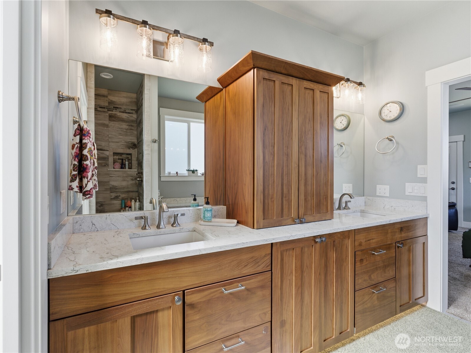 2128 McEldowney Road Malaga, WA 98828 - Photo 21 of 39 a bathroom with a double vanity sink mirror and double