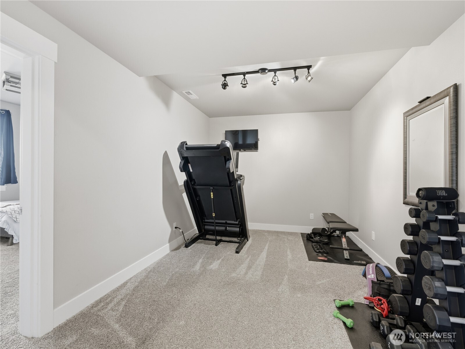 2128 McEldowney Road Malaga, WA 98828 - Photo 31 of 39 a view of a room with gym equipment