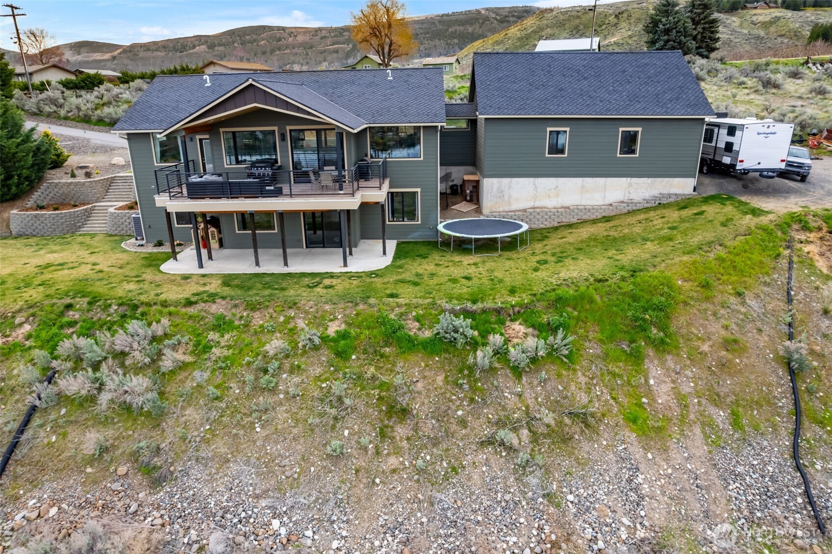 2128 McEldowney Road Malaga, WA 98828 - Photo 38 of 39 a front view of a house with garden