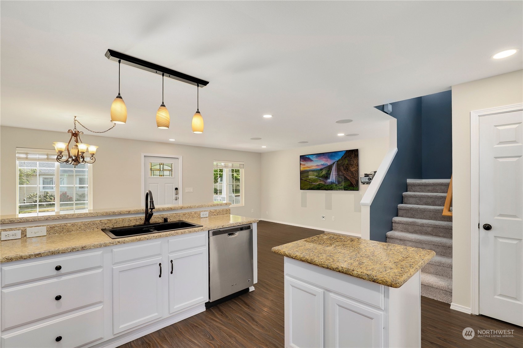4210 East R Street Tacoma, WA 98404 - Photo 15 of 40 a kitchen with granite countertop a sink a window and stainless steel appliances