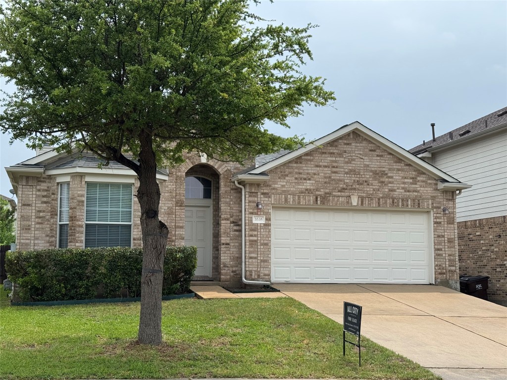 a front view of house with yard