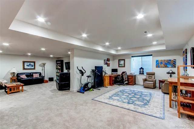 a living room with furniture and a table