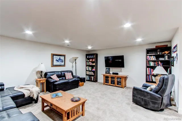 a living room with furniture and a couch