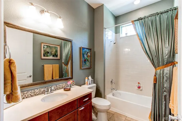 a bathroom with a shower and a tub