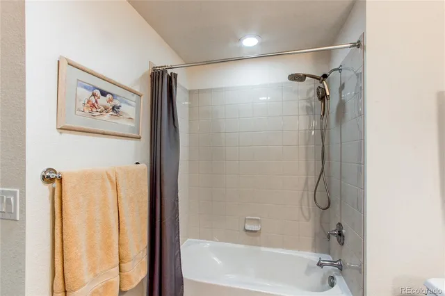a bathroom with a sink vanity and a mirror