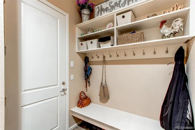 a view of entryway with wooden floor