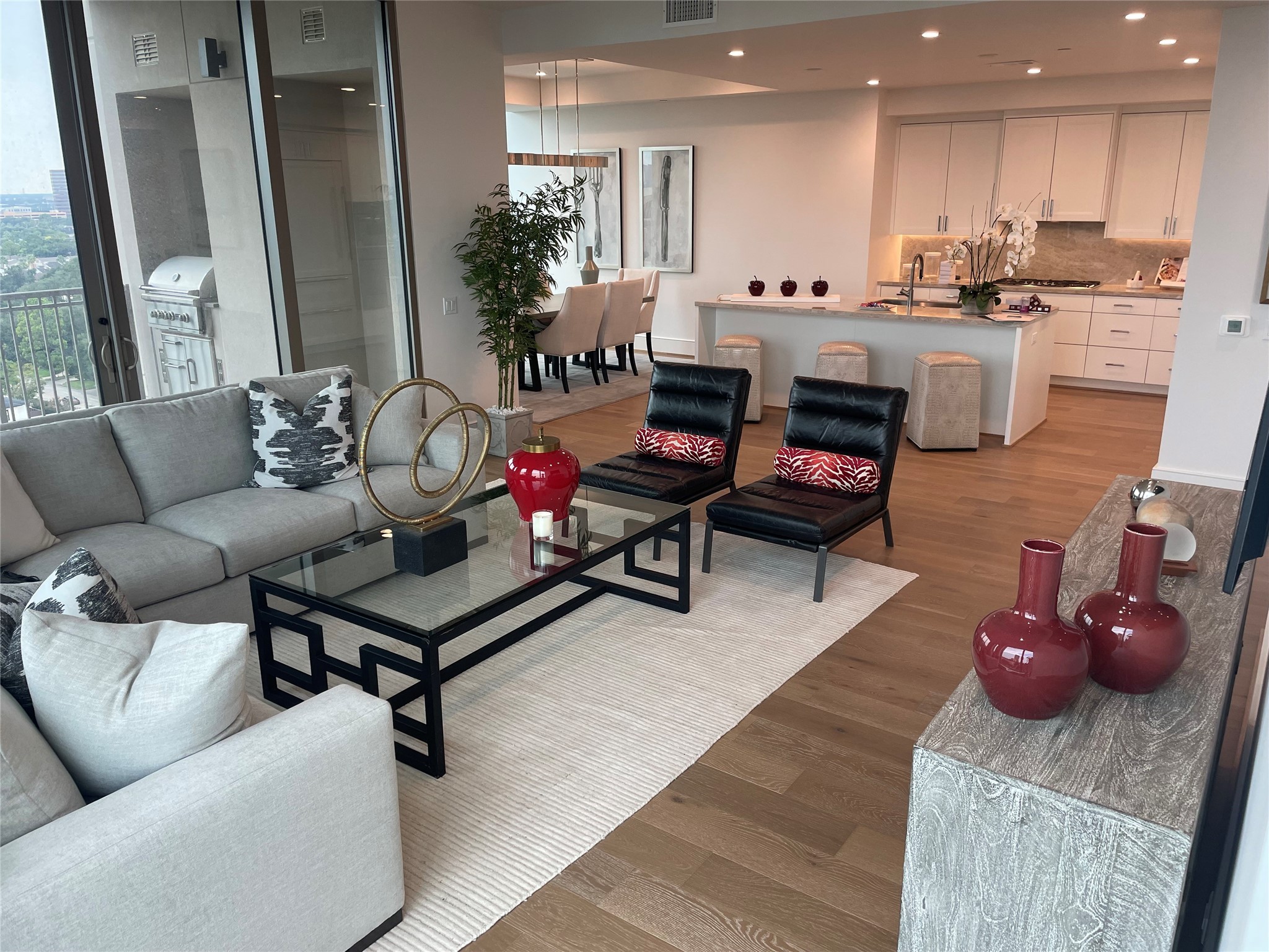 5656 San Felipe Street, Unit 1301 Houston, TX 77056 - Photo 5 of 30 a living room with furniture and wooden floor