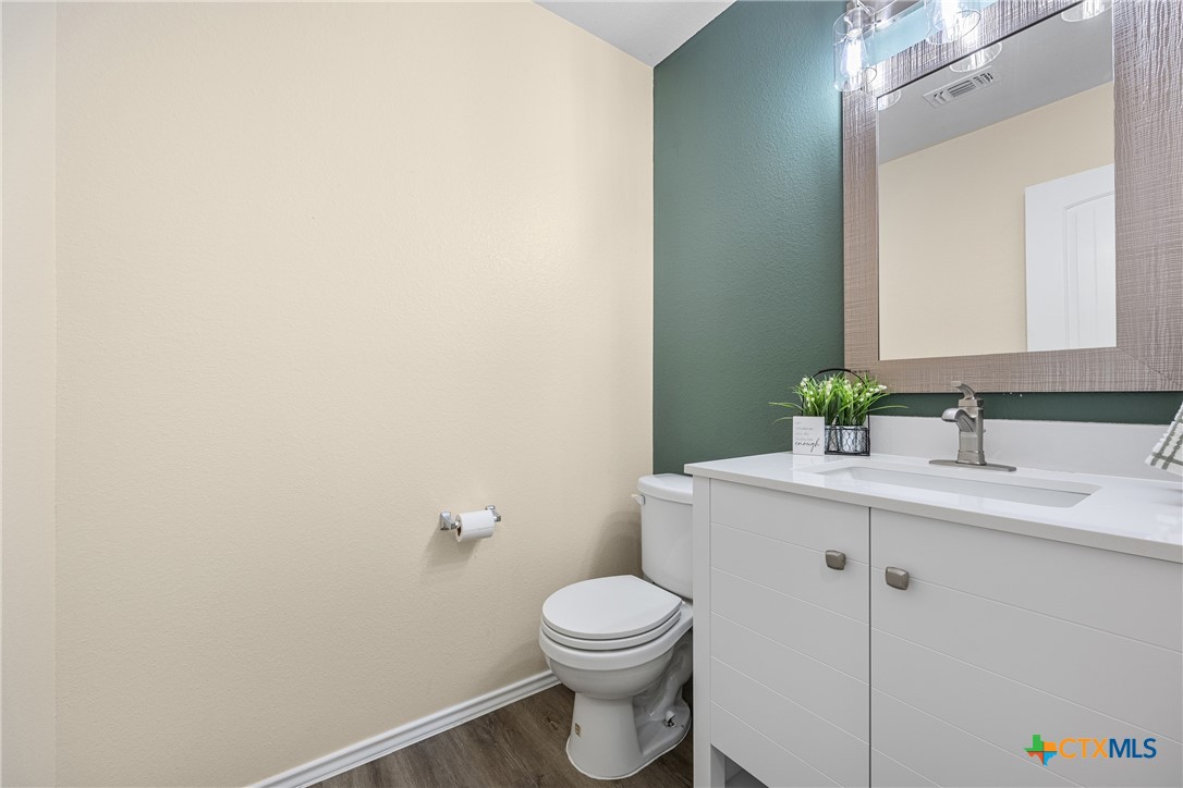 2114 Hamilton Lane Belton, TX 76513 - Photo 24 of 38 half bathroom on main level of home