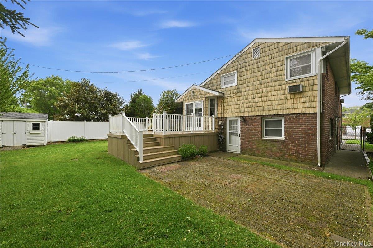 17 Avon Road Farmingdale, NY 11735 - Photo 40 of 46 a view of a house with backyard