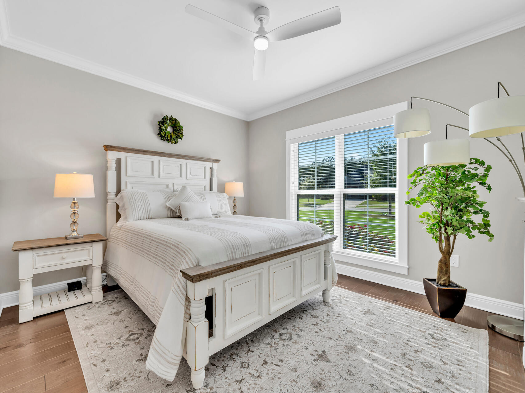310 Mill Pond Cove Freeport, FL 32439 - Photo 11 of 49 a bedroom with a large bed and a window