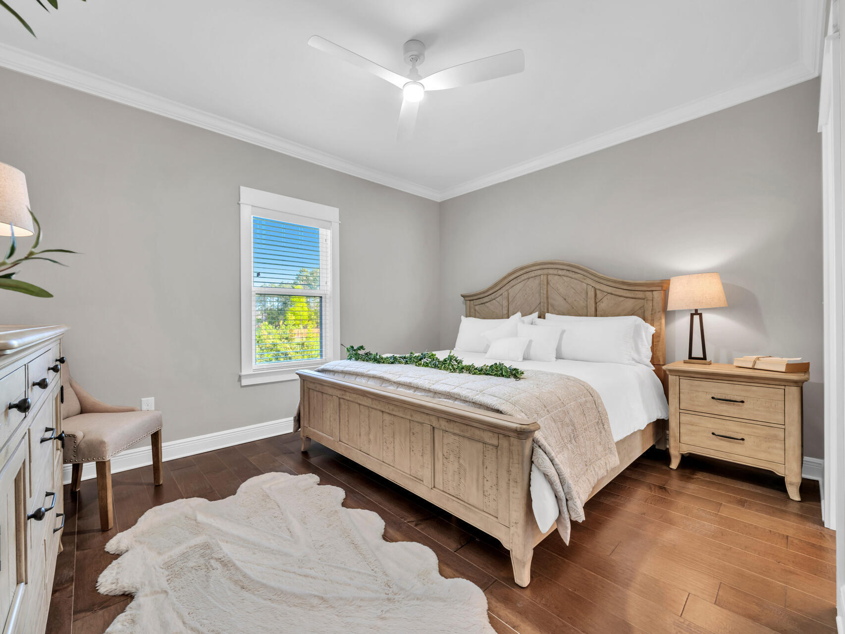 310 Mill Pond Cove Freeport, FL 32439 - Photo 14 of 49 a bedroom with a bed and a window