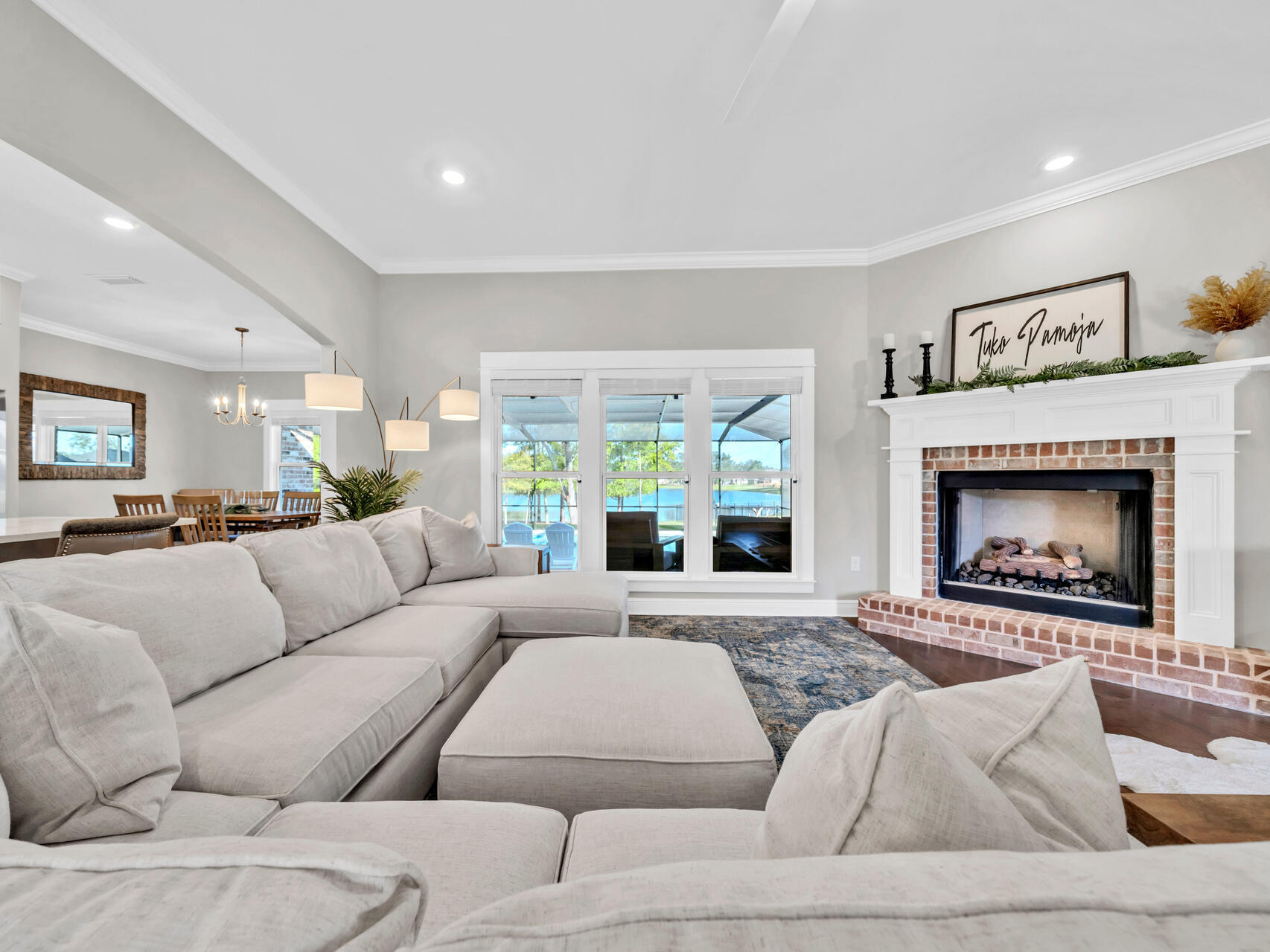 310 Mill Pond Cove Freeport, FL 32439 - Photo 19 of 49 a living room with furniture and a fireplace