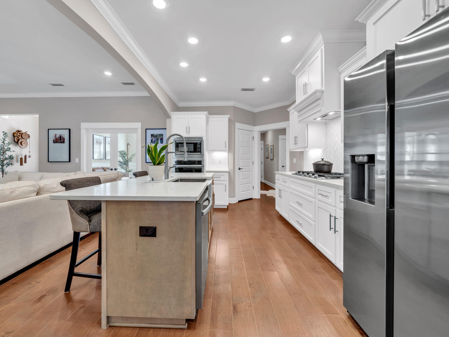310 Mill Pond Cove Freeport, FL 32439 - Photo 22 of 49 a kitchen with counter top space cabinets and stainless steel appliances