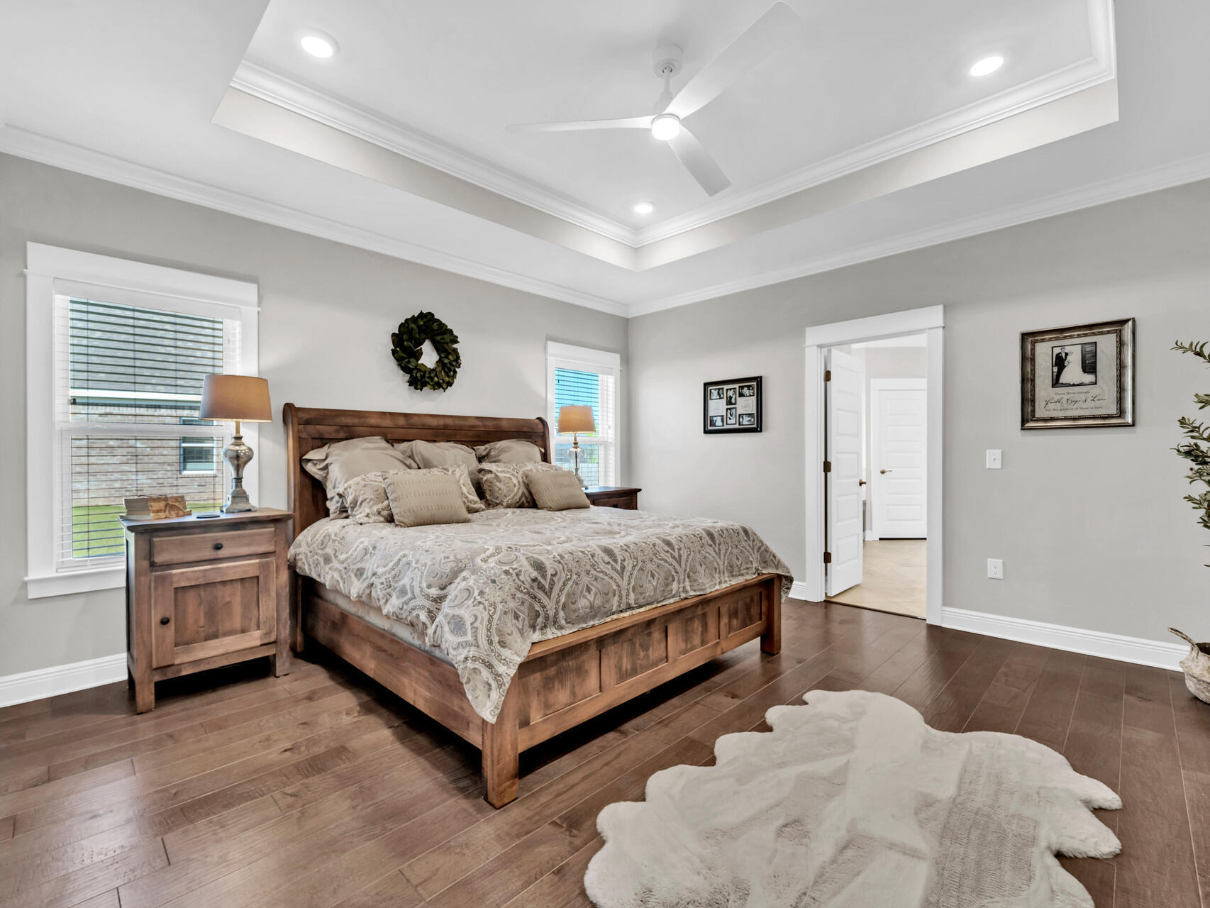 310 Mill Pond Cove Freeport, FL 32439 - Photo 26 of 49 a spacious bedroom with a bed and window
