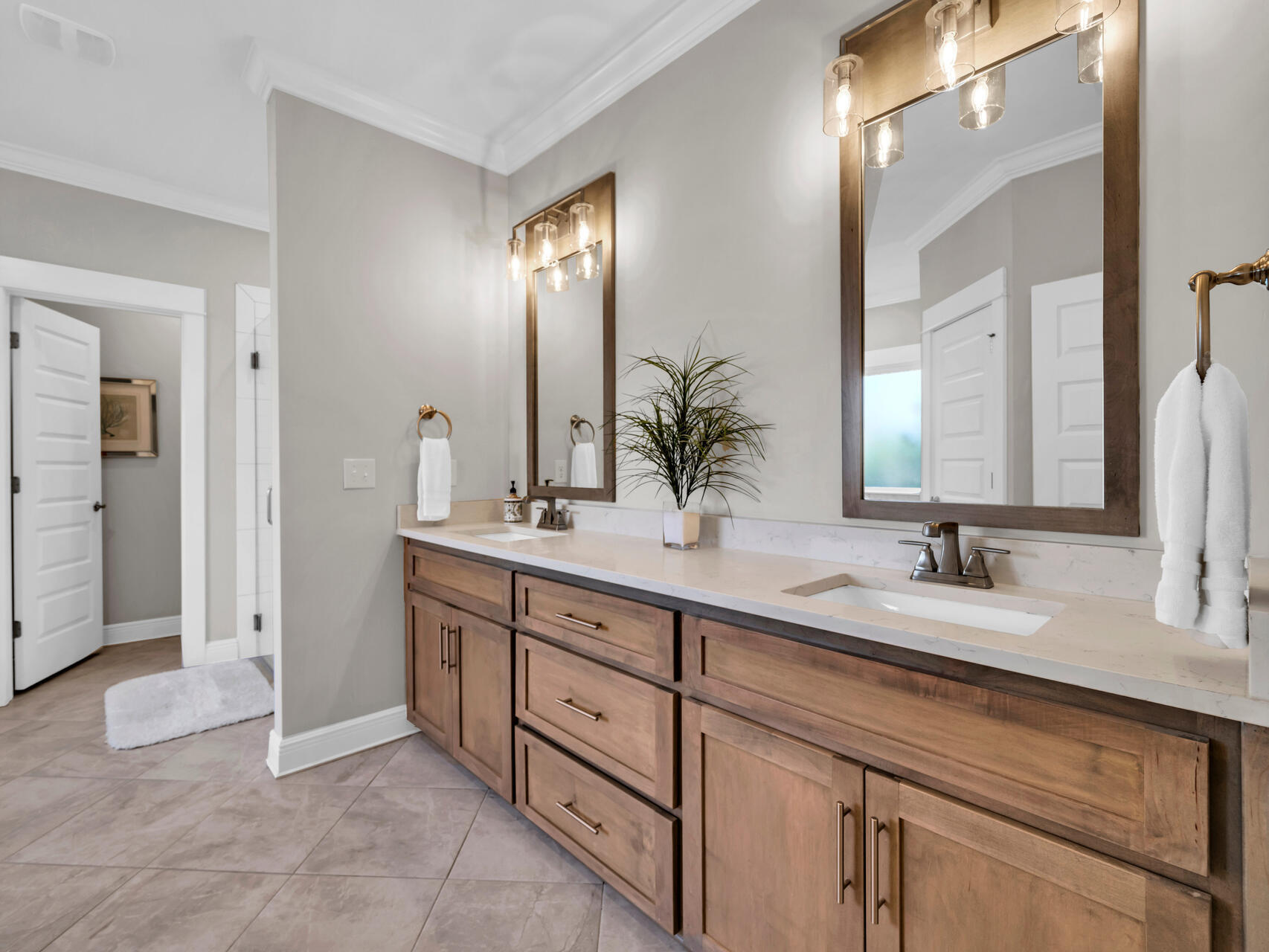 310 Mill Pond Cove Freeport, FL 32439 - Photo 27 of 49 a bathroom with double sink and a mirror