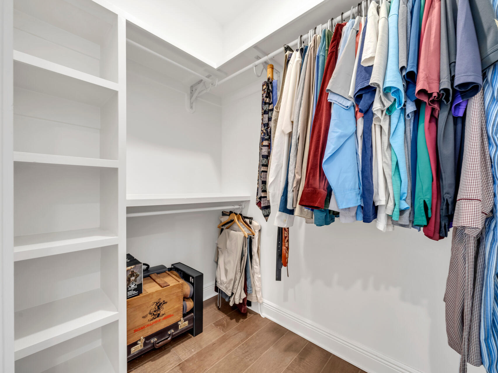 310 Mill Pond Cove Freeport, FL 32439 - Photo 30 of 49 a view of walk in closet with clothes and shoes