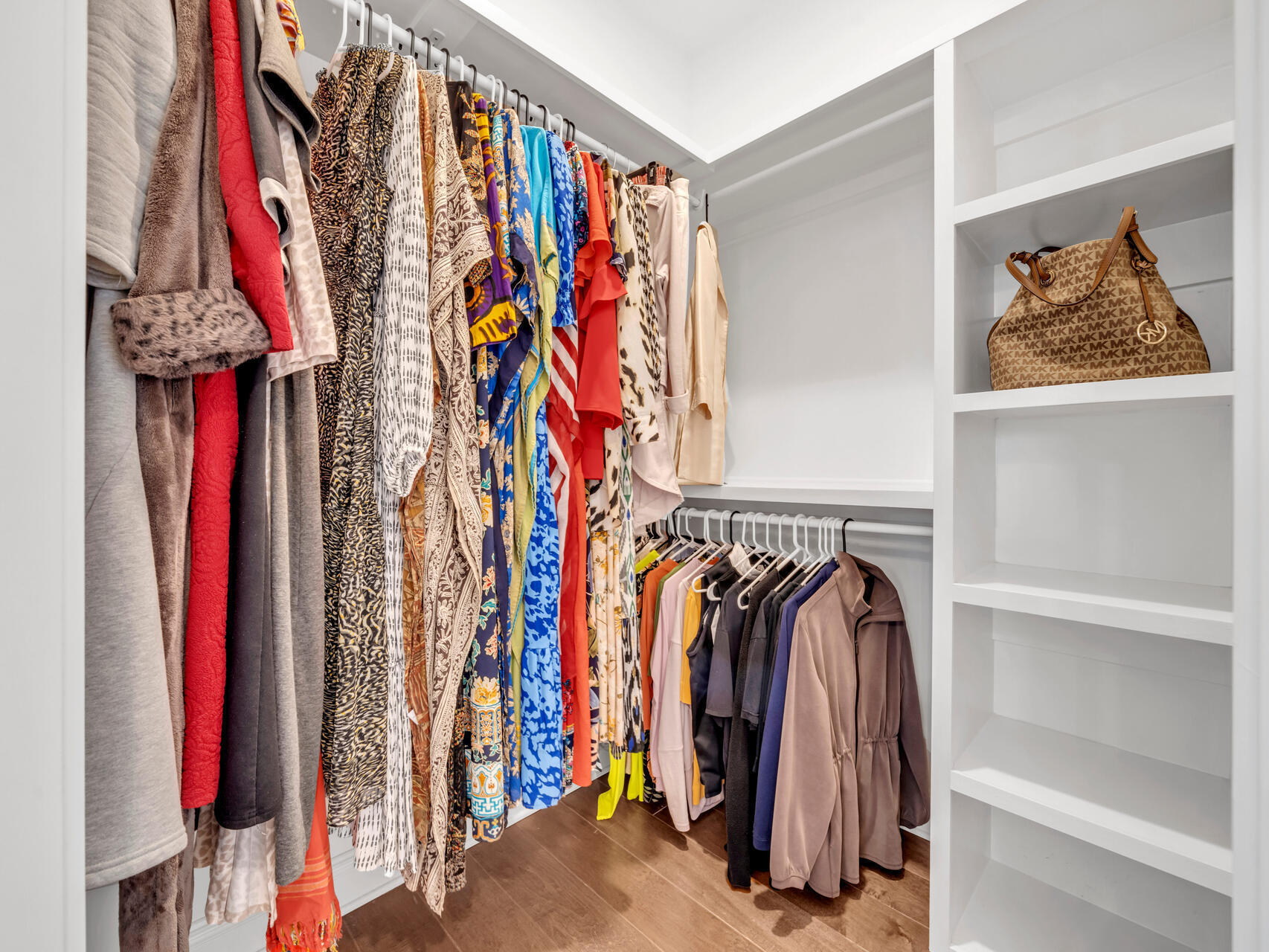 310 Mill Pond Cove Freeport, FL 32439 - Photo 31 of 49 a view of walk in closet with clothes