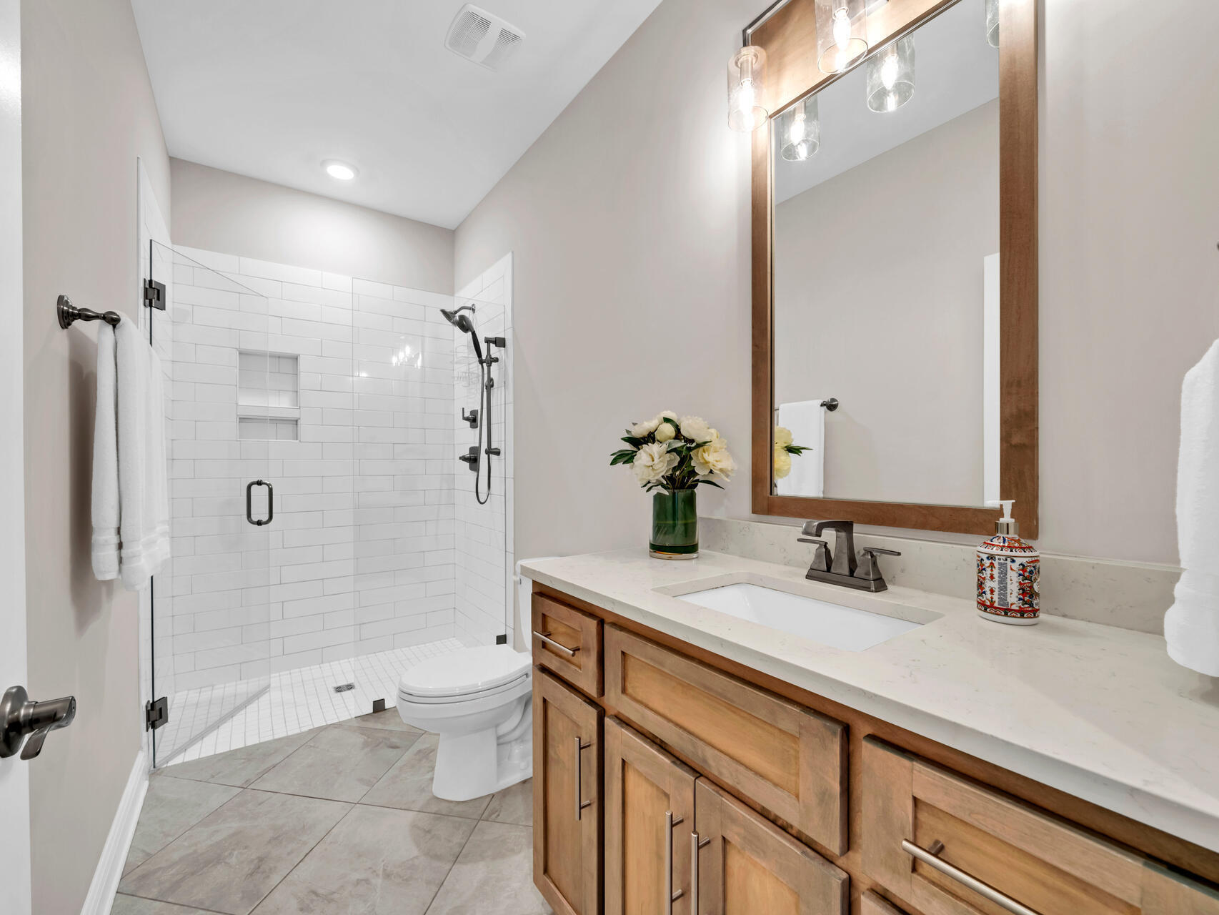 310 Mill Pond Cove Freeport, FL 32439 - Photo 32 of 49 a bathroom with a sink a toilet and shower