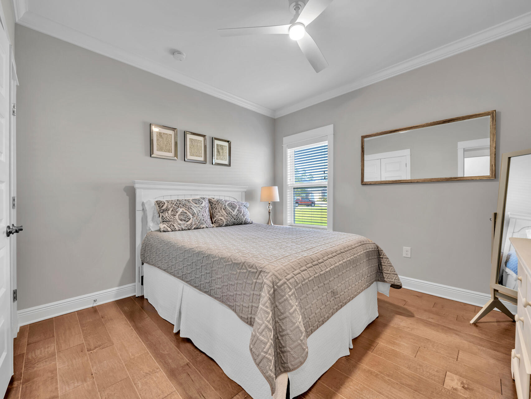 310 Mill Pond Cove Freeport, FL 32439 - Photo 33 of 49 a bedroom with a bed and a window