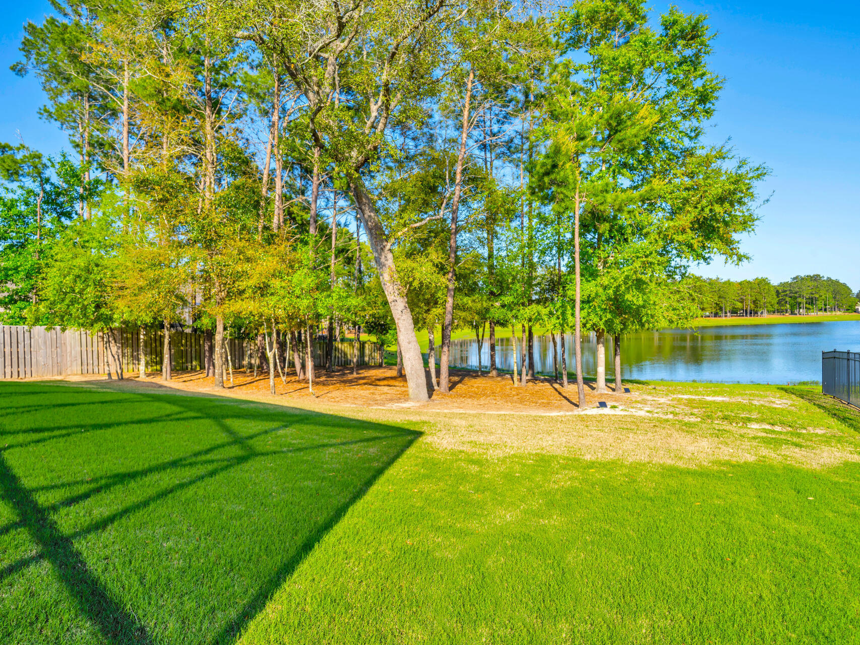 310 Mill Pond Cove Freeport, FL 32439 - Photo 36 of 49 a view of a house with a big yard