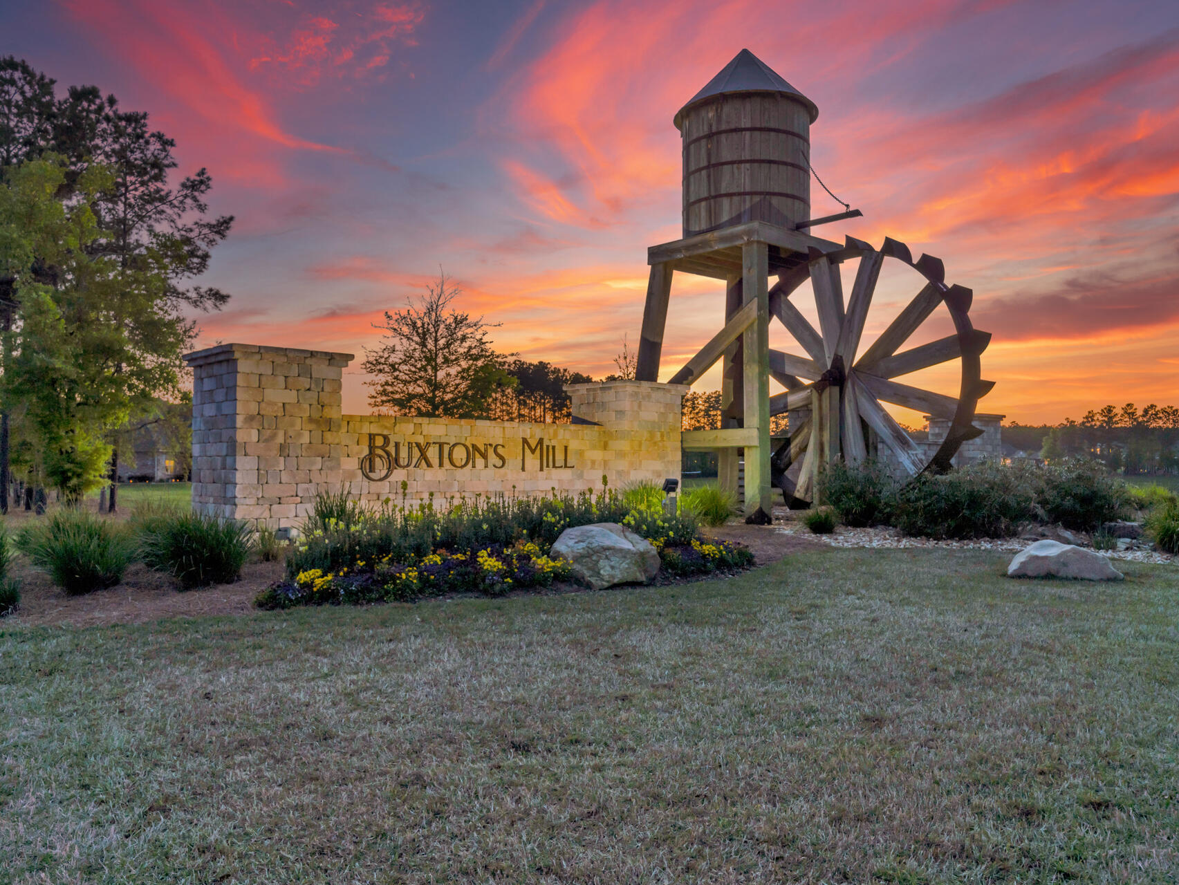 310 Mill Pond Cove Freeport, FL 32439 - Photo 43 of 49 a front view of a house with garden
