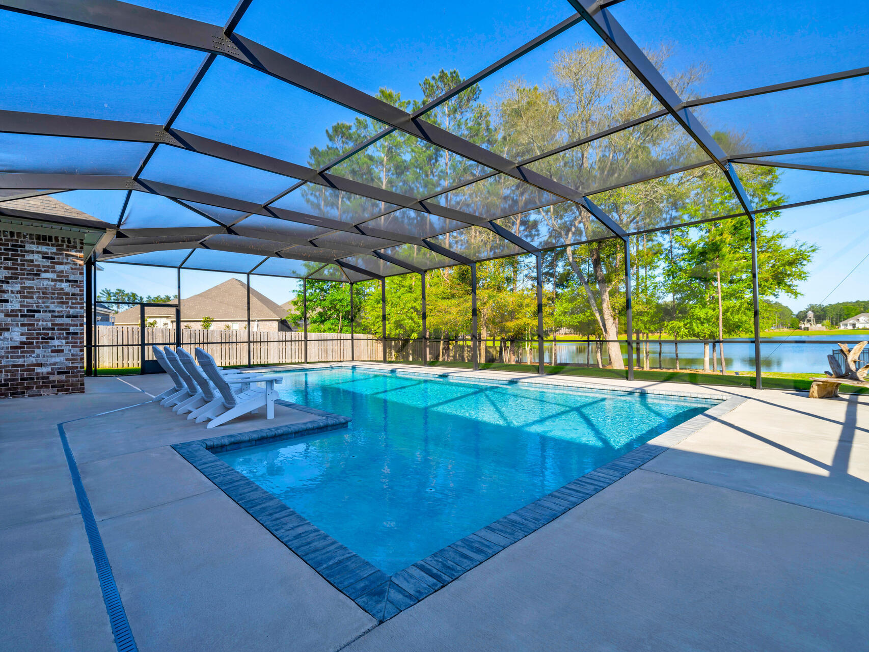310 Mill Pond Cove Freeport, FL 32439 - Photo 5 of 49 a view of a swimming pool with a patio