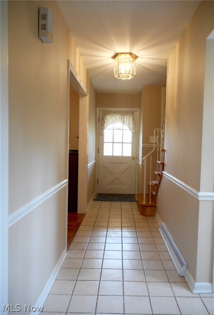 856 Old Spring Road Akron, OH 44321 - Photo 3 of 30 The foyer is freshly painted and welcomes your guests into the home.