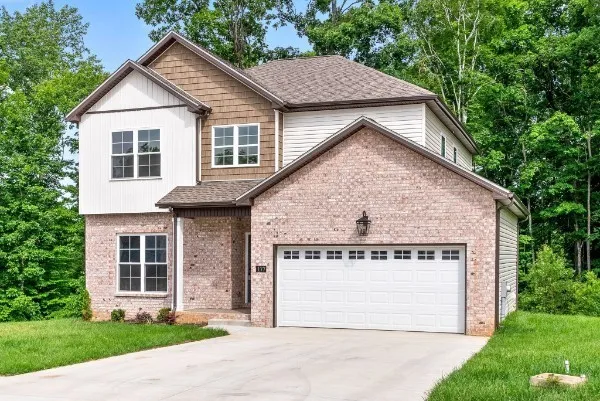 a view of a house with garden