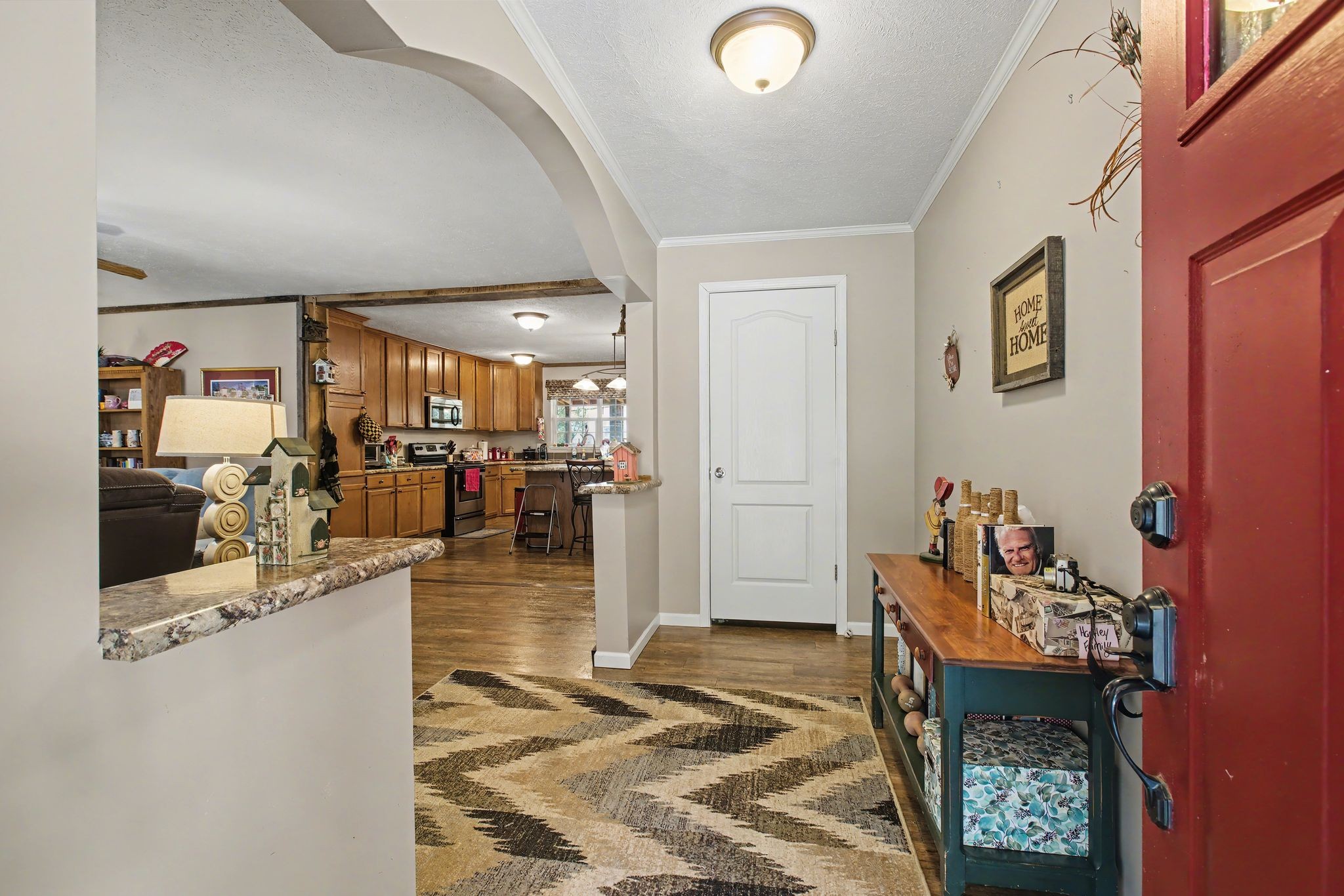 10878 Highway 7 Primm Springs, TN 38476 - Photo 16 of 37 a view of a living room and dining room