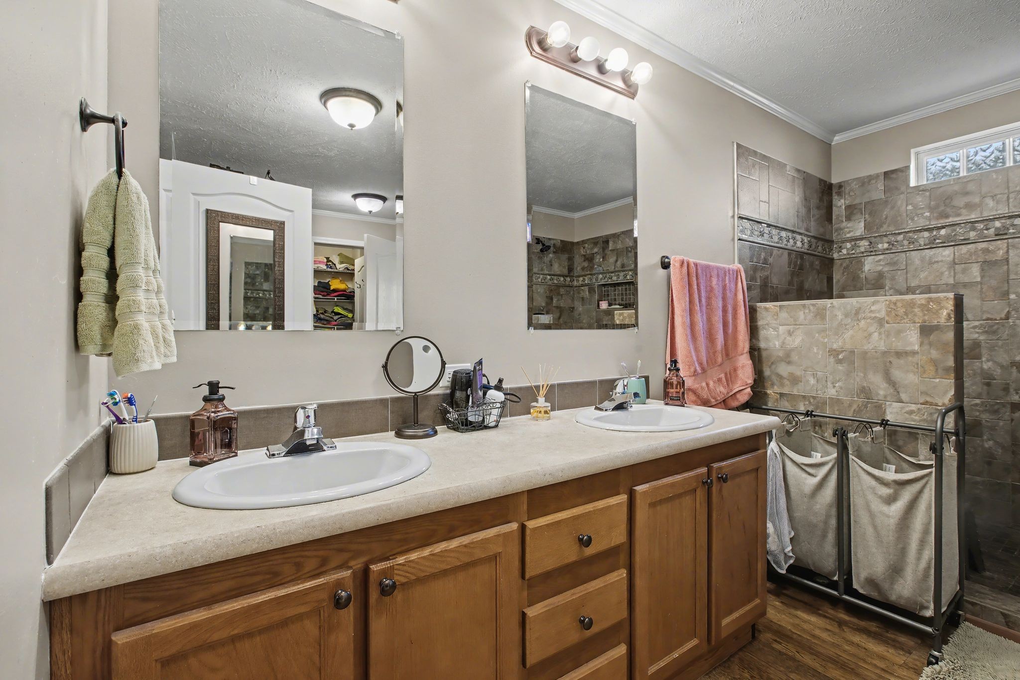 10878 Highway 7 Primm Springs, TN 38476 - Photo 27 of 37 a bathroom with a sink and a mirror