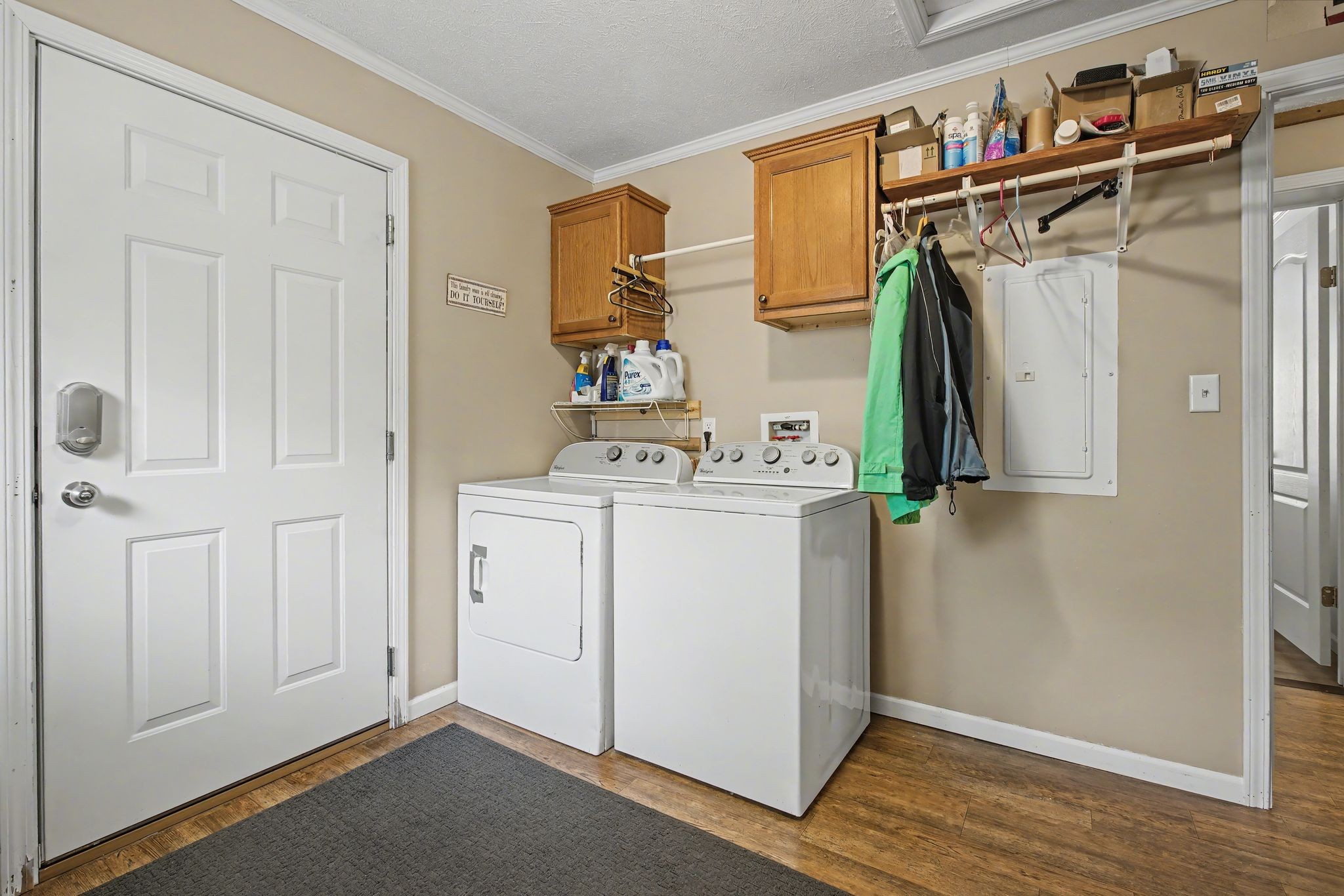 10878 Highway 7 Primm Springs, TN 38476 - Photo 36 of 37 a utility room with cabinets