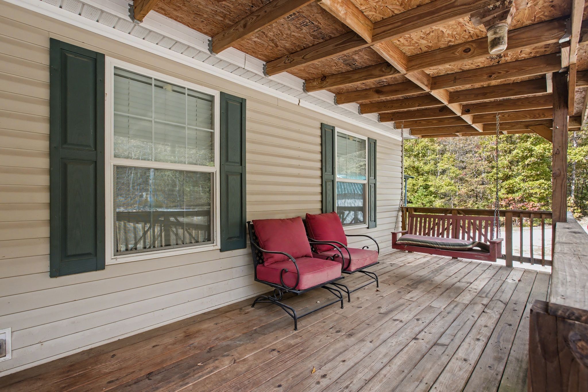 10878 Highway 7 Primm Springs, TN 38476 - Photo 9 of 37 a balcony with wooden floor