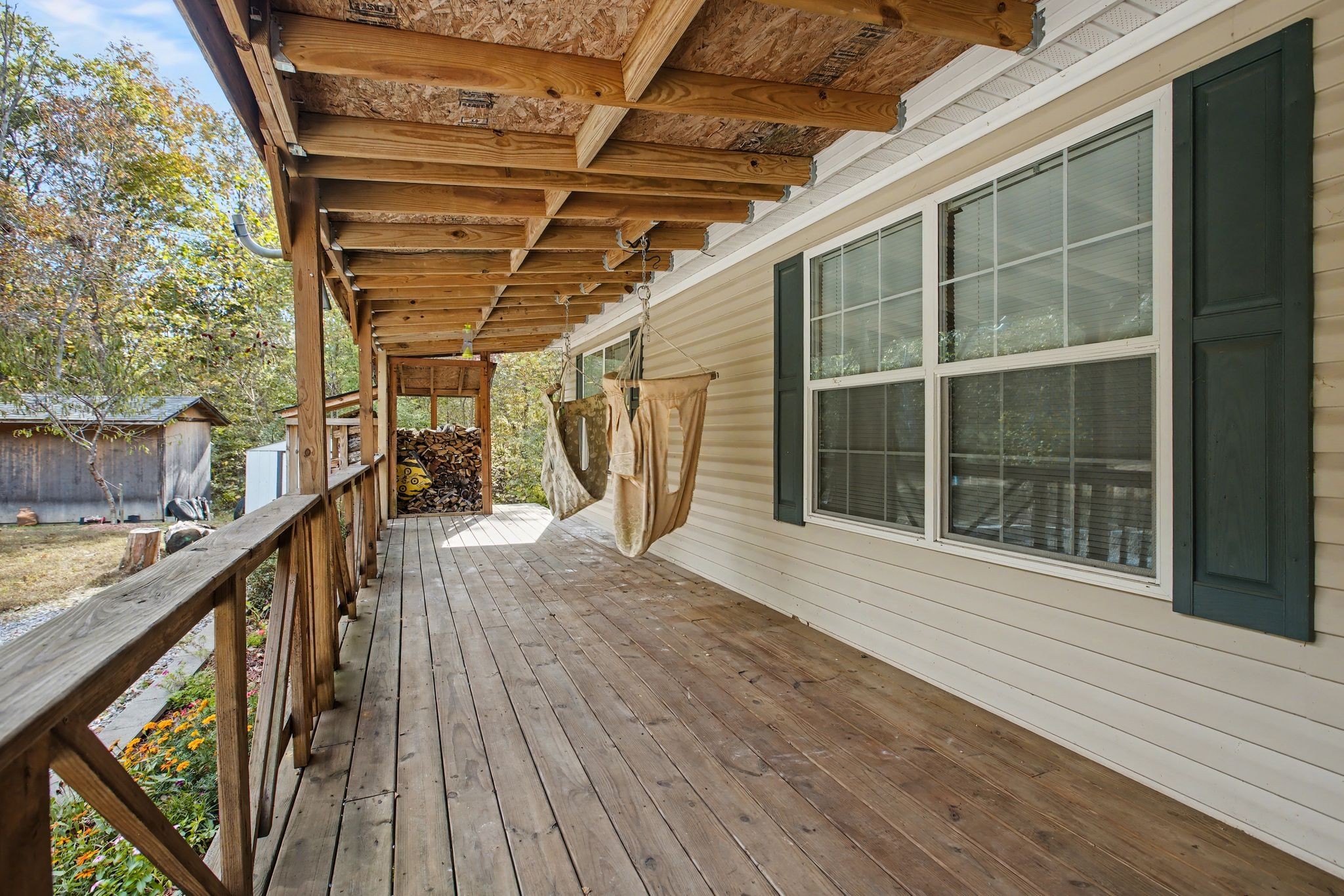 10878 Highway 7 Primm Springs, TN 38476 - Photo 10 of 37 a view of a balcony with wooden floor