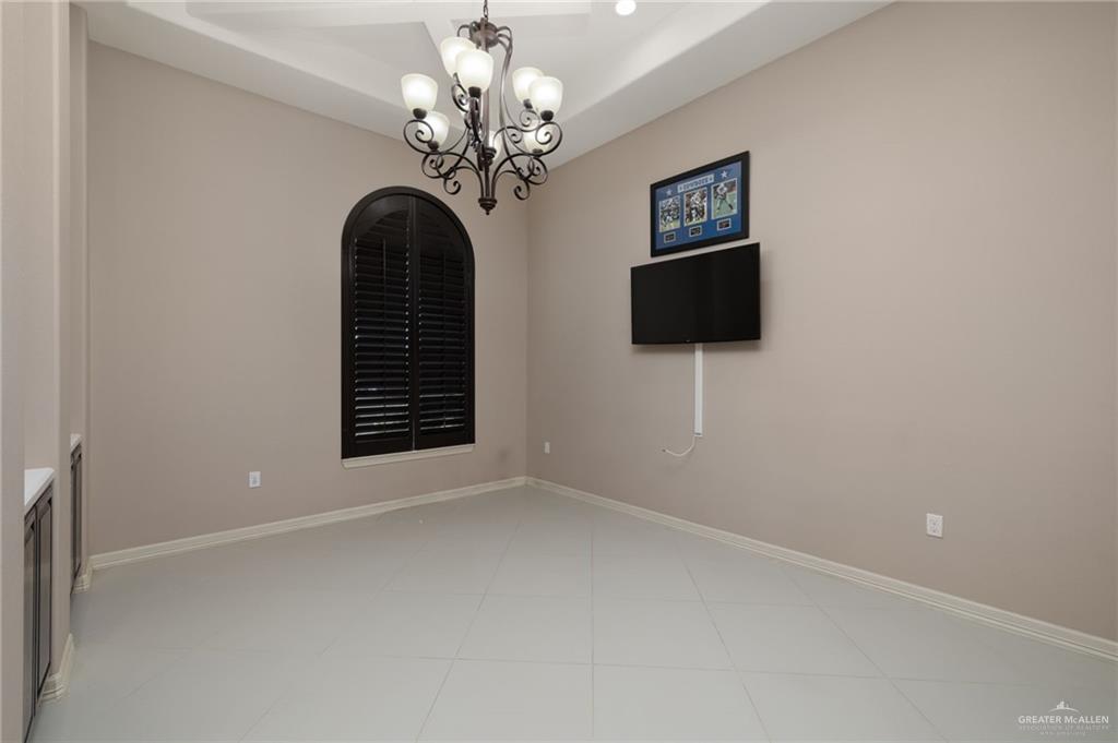 1202 Hummingbird Drive Pharr, TX 78577 - Photo 4 of 23 a view of a chandelier in a room