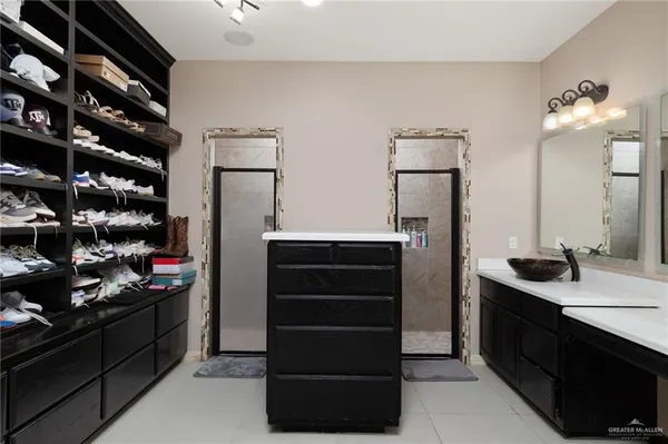 a kitchen with a refrigerator and a stove