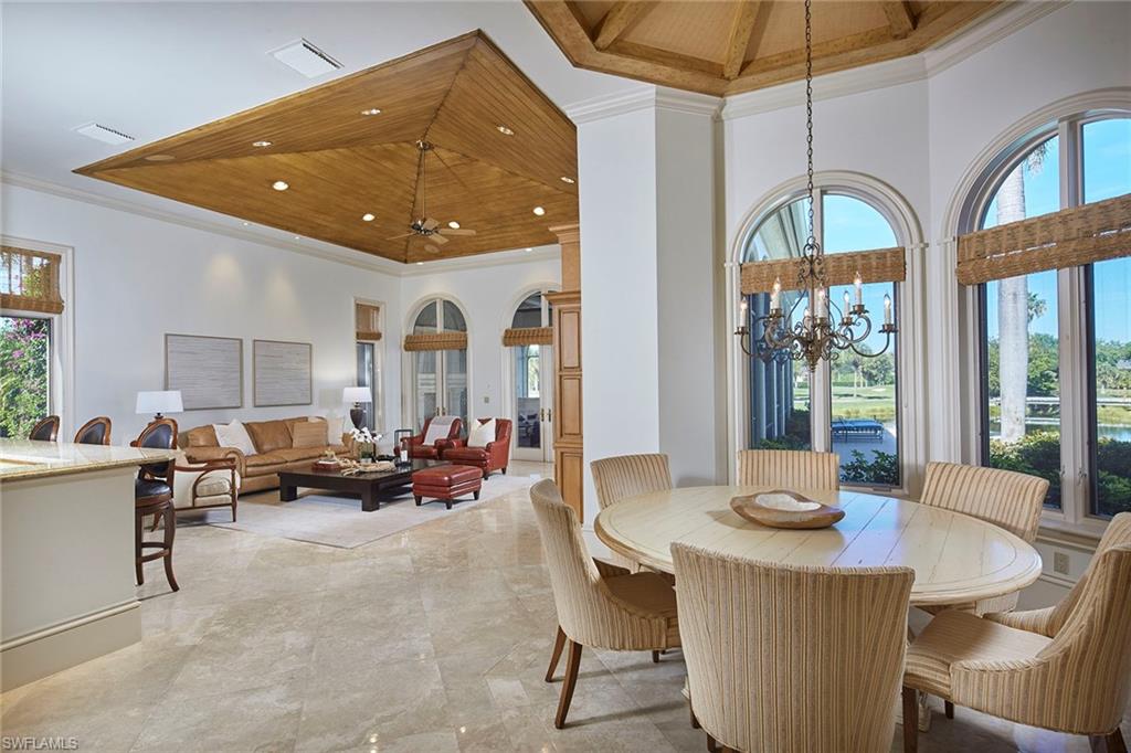 1397 Great Egret Trail Naples, FL 34105 - Photo 17 of 50 a view of a dining room with furniture window and outside view