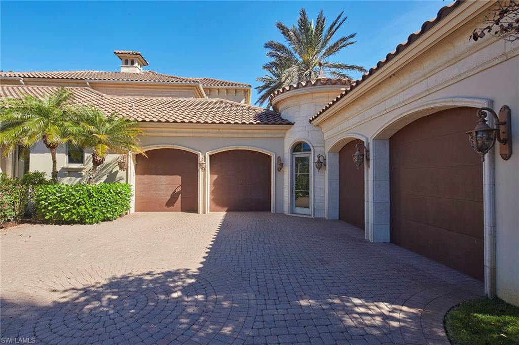 1397 Great Egret Trail Naples, FL 34105 - Photo 43 of 50 a front view of a house