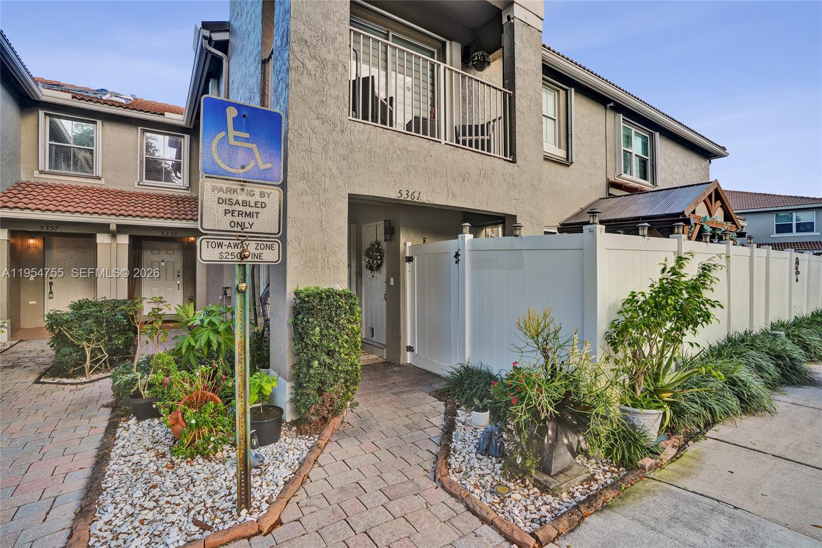 5361 Southwest 125th Avenue Miramar, FL 33027 - Photo 27 of 38 a front view of a house with garden