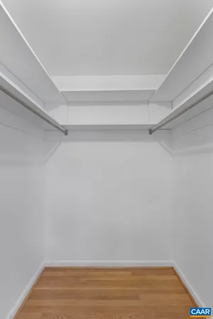 a view of a room with racks on the wall