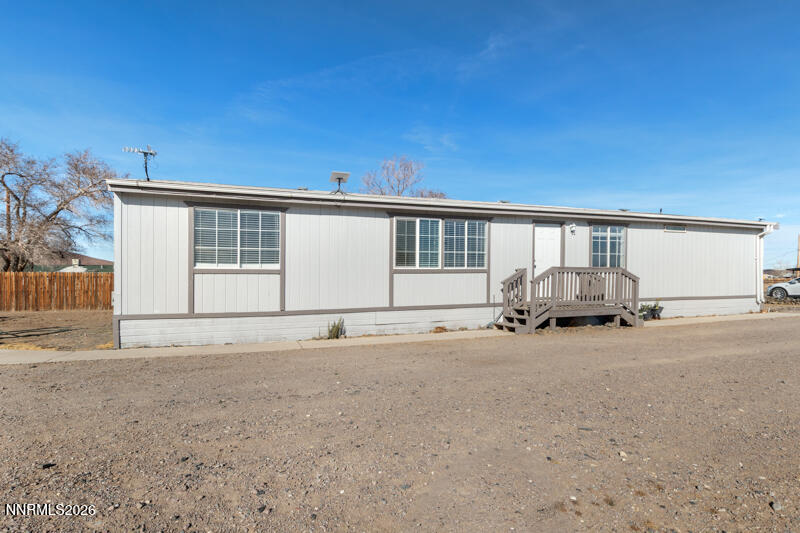 2575 Tonopah Street Silver Springs, NV 89429 - Photo 1 of 22 a view of car parked in front of house