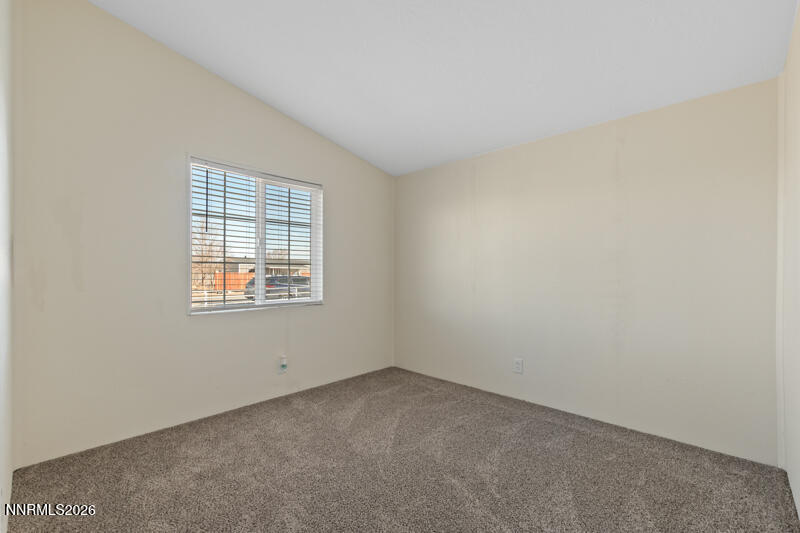 2575 Tonopah Street Silver Springs, NV 89429 - Photo 14 of 22 an empty room with a window