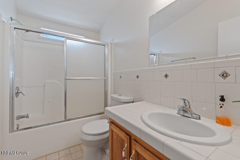 2575 Tonopah Street Silver Springs, NV 89429 - Photo 16 of 22 a bathroom with a sink and a toilet