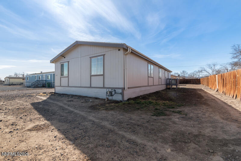 2575 Tonopah Street Silver Springs, NV 89429 - Photo 21 of 22 a view of a house with backyard