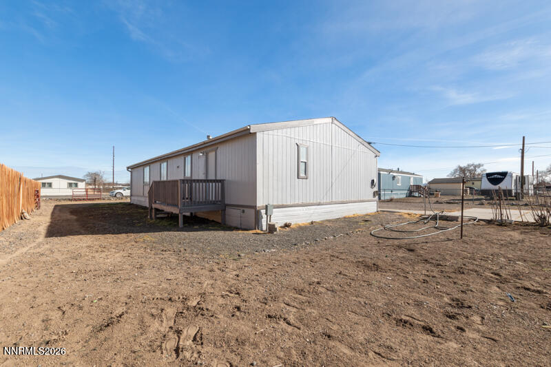 2575 Tonopah Street Silver Springs, NV 89429 - Photo 22 of 22 a view of a house with backyard